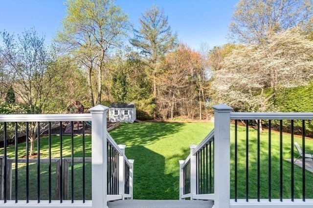 view of yard with a storage shed and an outdoor structure