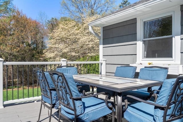 deck with outdoor dining space