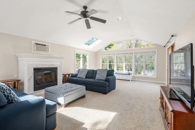 carpeted living room with lofted ceiling, a fireplace, recessed lighting, a wall unit AC, and a ceiling fan