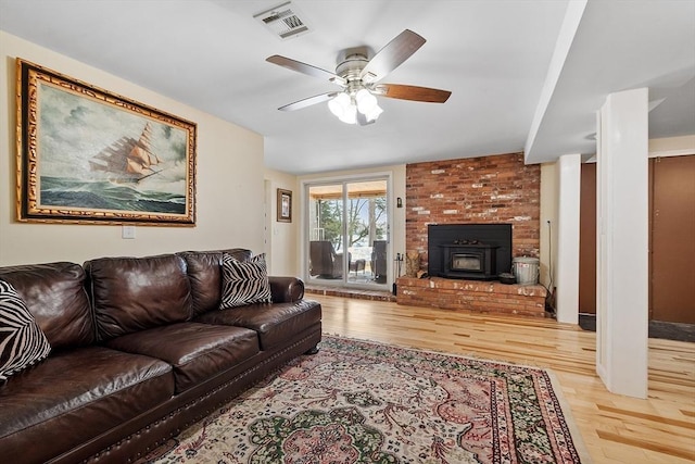 407 Mountain Rd, Jaffrey, NH 03452 - living area with visible vents, a ceiling fan, and wood finished floors