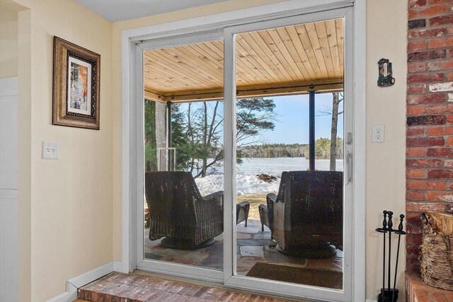 407 Mountain Rd, Jaffrey, NH 03452 - entryway featuring baseboards, floor to ceiling windows, and wood ceiling