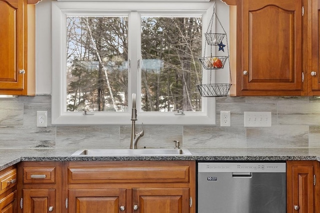 407 Mountain Rd, Jaffrey, NH 03452 - kitchen with a sink, brown cabinetry, a healthy amount of sunlight, and stainless steel dishwasher