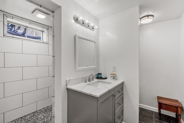407 Mountain Rd, Jaffrey, NH 03452 - full bath with vanity, baseboards, and a tile shower