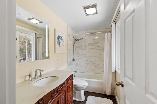 407 Mountain Rd, Jaffrey, NH 03452 - full bath with visible vents, toilet, shower / bath combo with shower curtain, and vanity