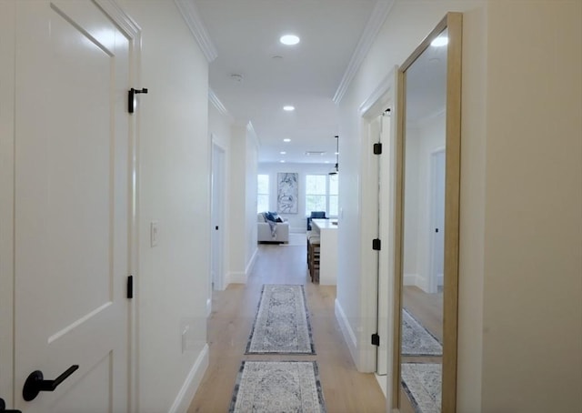 18 Franklin Unit 303A, Salem, MA 01970 - hallway with ornamental molding, light wood finished floors, baseboards, and recessed lighting