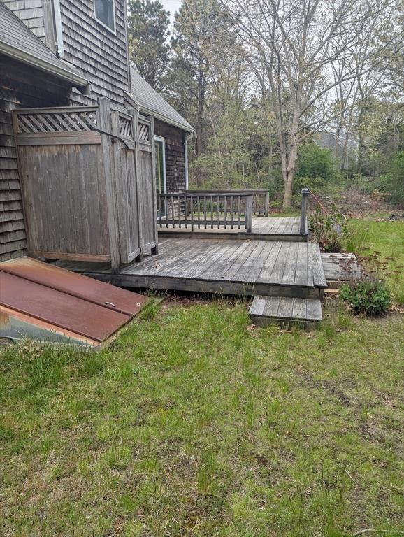 255 Massasoit Rd, Eastham, MA 02642 - wooden terrace featuring a yard