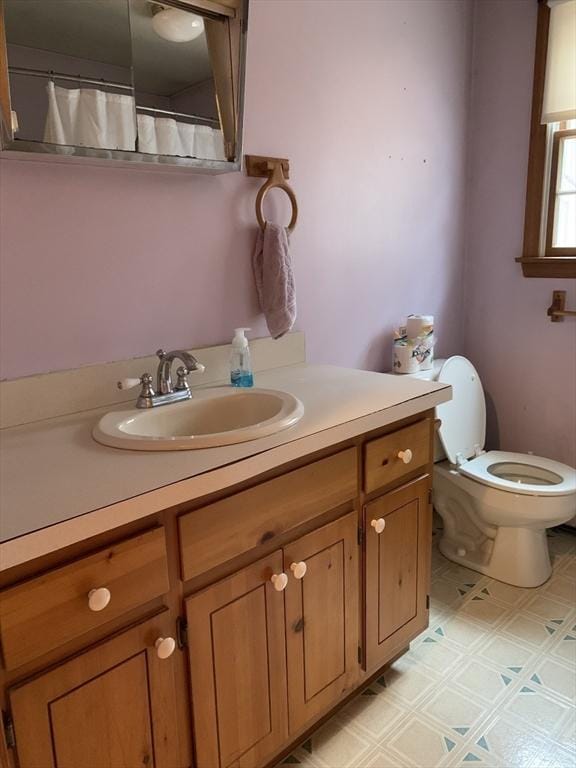 255 Massasoit Rd, Eastham, MA 02642 - full bathroom featuring toilet, vanity, and tile patterned floors