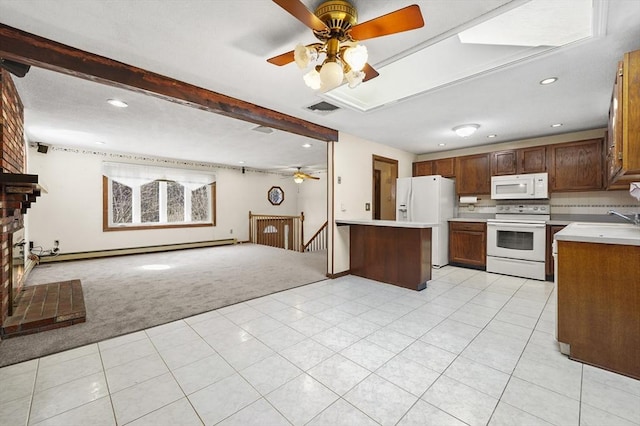 kitchen with light carpet, open floor plan, white appliances, light countertops, and ceiling fan