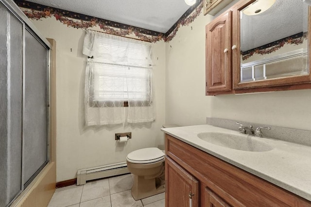 full bath featuring tile patterned floors, toilet, a baseboard heating unit, a textured ceiling, and vanity