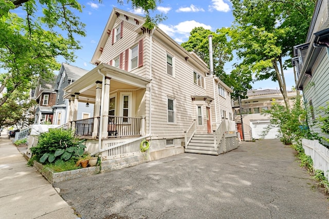 view of side of property with a garage