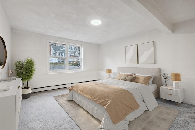 bedroom with light carpet, beamed ceiling, and a baseboard radiator