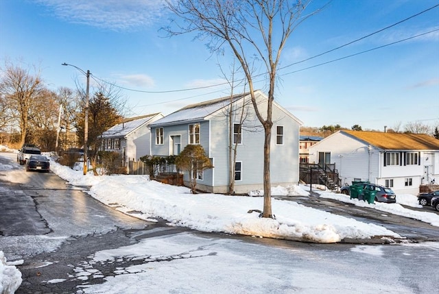 view of front of home with a residential view