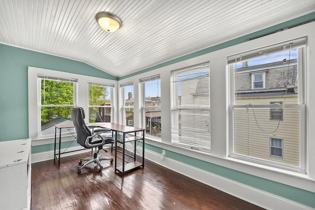 home office featuring lofted ceiling, wood-type flooring, and baseboards