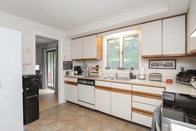 419 Southwick Rd Unit A3, Westfield, MA 01085 - kitchen with white dishwasher, white cabinetry, light countertops, and stove