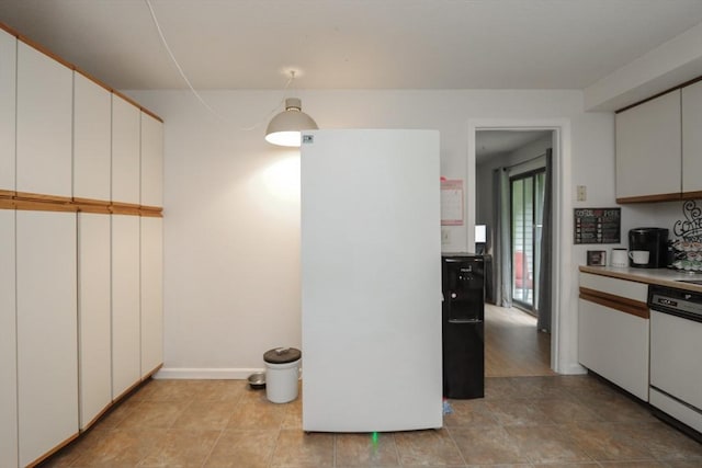 419 Southwick Rd Unit A3, Westfield, MA 01085 - kitchen with white appliances, white cabinetry, light countertops, and light tile patterned floors