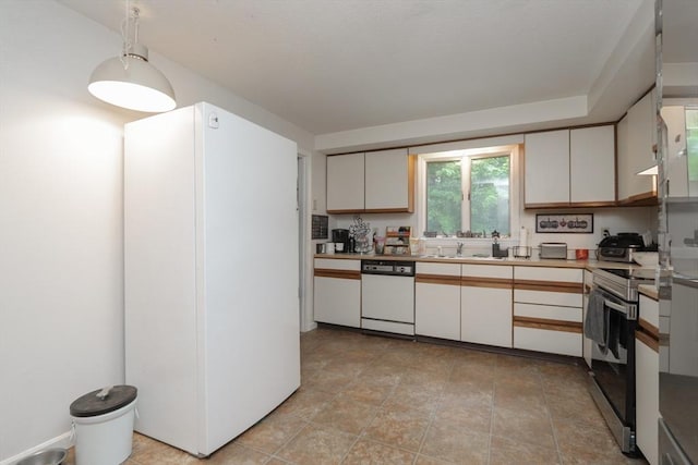 419 Southwick Rd Unit A3, Westfield, MA 01085 - kitchen with white appliances, light countertops, white cabinetry, and pendant lighting