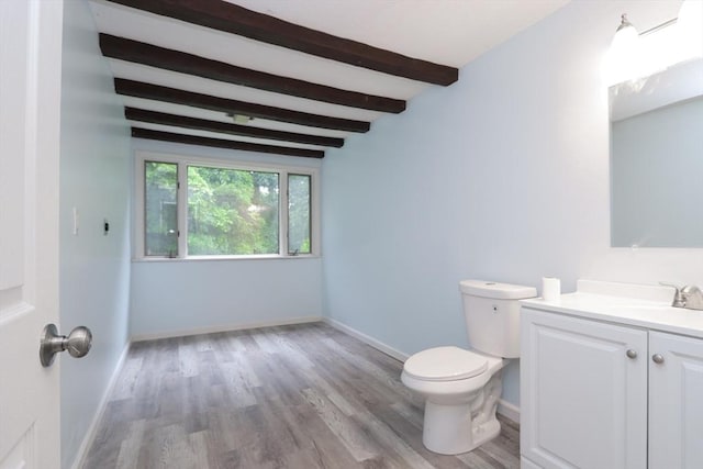 419 Southwick Rd Unit A3, Westfield, MA 01085 - bathroom with beamed ceiling, vanity, and wood finished floors