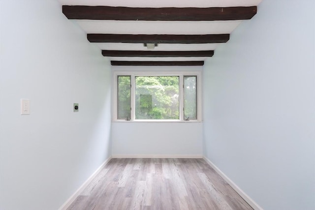 419 Southwick Rd Unit A3, Westfield, MA 01085 - empty room with beam ceiling and wood finished floors