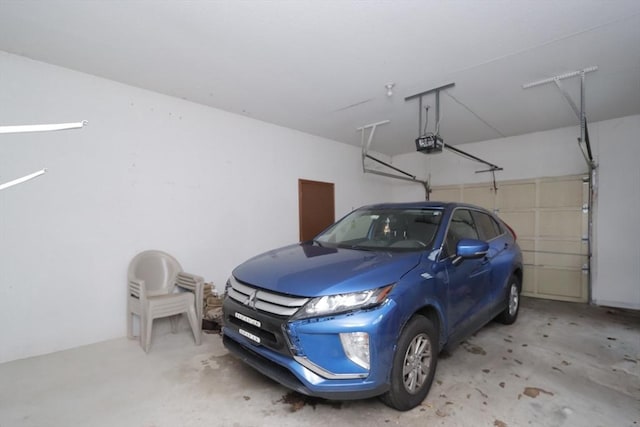 419 Southwick Rd Unit A3, Westfield, MA 01085 - garage featuring a garage door opener