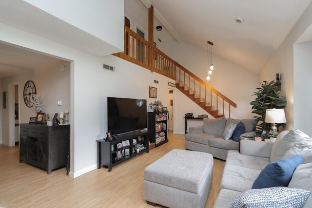 419 Southwick Rd Unit A3, Westfield, MA 01085 - living room with light wood-style flooring and stairway