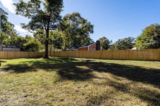view of yard featuring fence