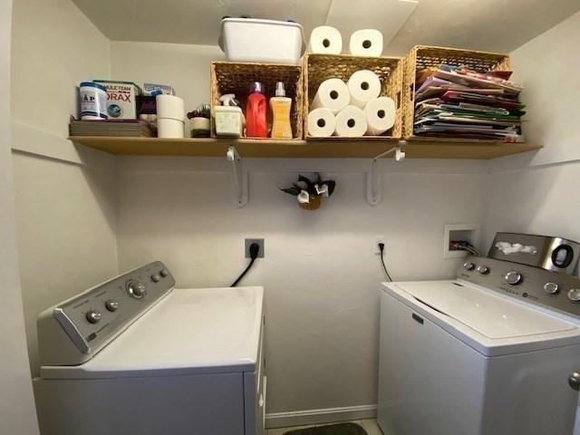 washroom with laundry area and washer and clothes dryer