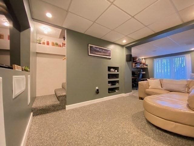 home theater with carpet floors, recessed lighting, a paneled ceiling, and baseboards