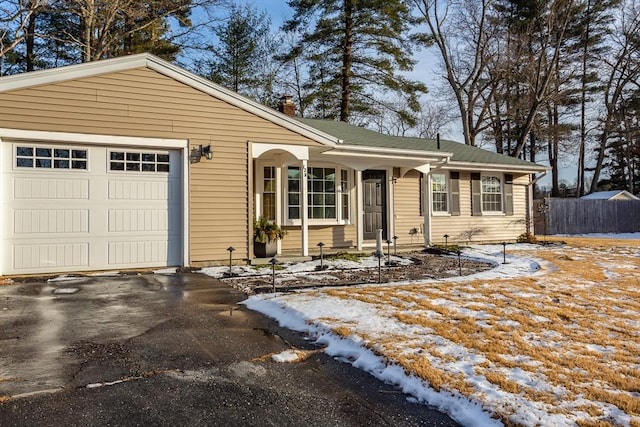 single story home featuring a garage