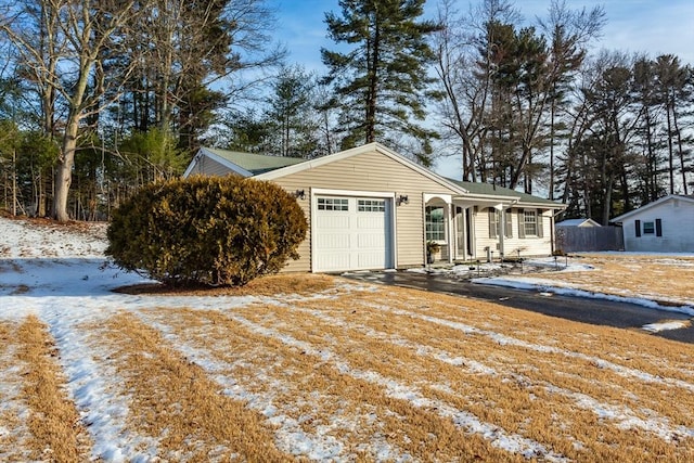 view of front of property featuring a garage