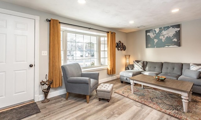 living room featuring light hardwood / wood-style floors