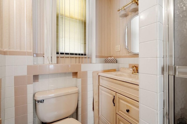 114 Byron St, Boston, MA 02128 - bathroom with vanity, tile walls, toilet, and a shower stall