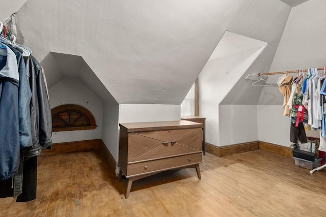 114 Byron St, Boston, MA 02128 - walk in closet featuring wood finished floors and lofted ceiling