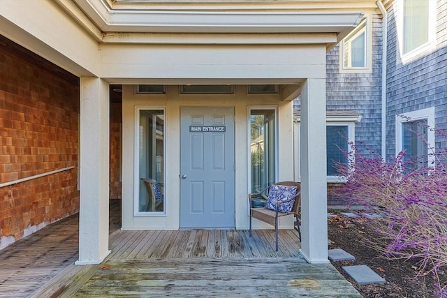 doorway to property with a deck