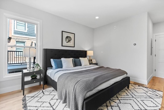 bedroom featuring light wood-type flooring