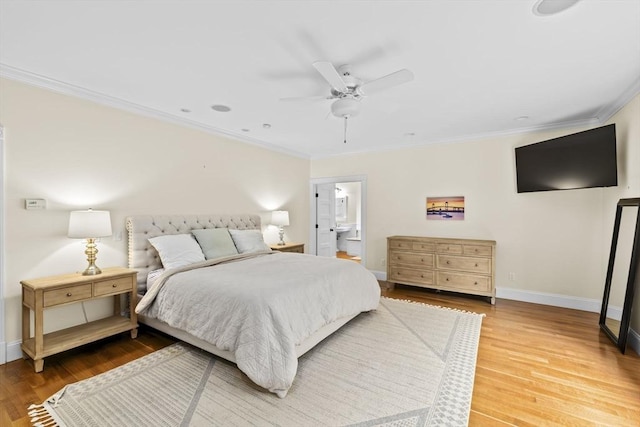 54 Garrison Dr, Scituate, MA 02066 - bedroom featuring crown molding, baseboards, wood finished floors, a ceiling fan, and ensuite bathroom