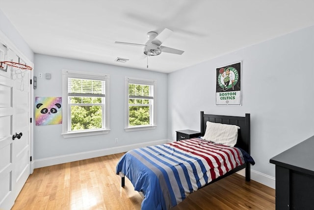54 Garrison Dr, Scituate, MA 02066 - bedroom featuring wood finished floors, baseboards, and a ceiling fan