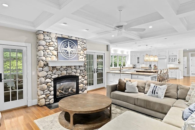 54 Garrison Dr, Scituate, MA 02066 - living room featuring coffered ceiling, ceiling fan, recessed lighting, light wood finished floors, and beamed ceiling