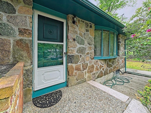 18 Shady Oak Dr, Mattapoisett, MA 02739 - view of exterior entry featuring stone siding