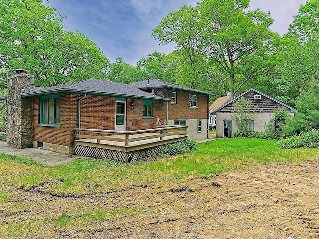 18 Shady Oak Dr, Mattapoisett, MA 02739 - rear view of house featuring a deck, a chimney, and brick siding