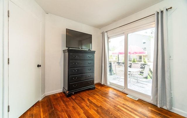83 Armstrong St, West Springfield, MA 01089 - bedroom featuring access to exterior and dark wood-style flooring