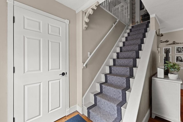 47-49 Dean St, Norton, MA 02766 - stairs featuring wood finished floors and crown molding