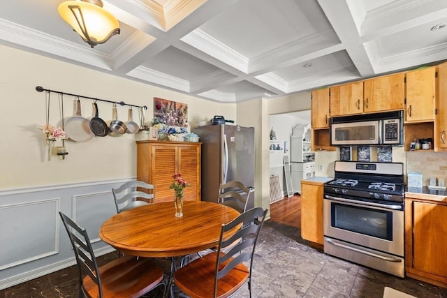 47-49 Dean St, Norton, MA 02766 - kitchen with stainless steel appliances, beamed ceiling, coffered ceiling, crown molding, and light countertops