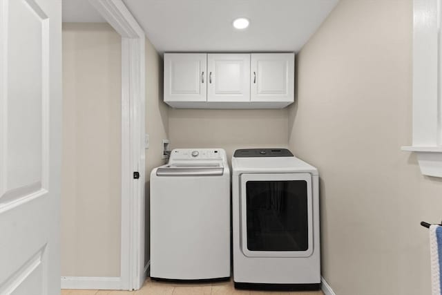 47-49 Dean St, Norton, MA 02766 - washroom featuring separate washer and dryer, cabinet space, recessed lighting, and light tile patterned floors