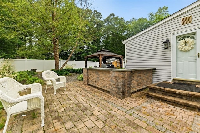 47-49 Dean St, Norton, MA 02766 - fenced backyard with a gazebo and a patio