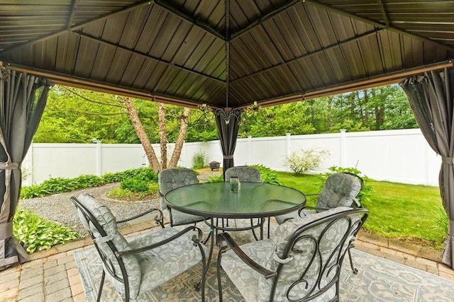 47-49 Dean St, Norton, MA 02766 - fenced backyard with outdoor dining area, a patio, and a gazebo