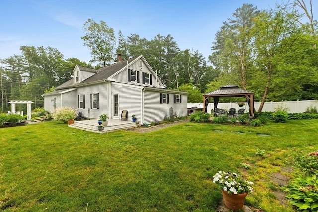 47-49 Dean St, Norton, MA 02766 - rear view of house with a gazebo, a chimney, and a deck