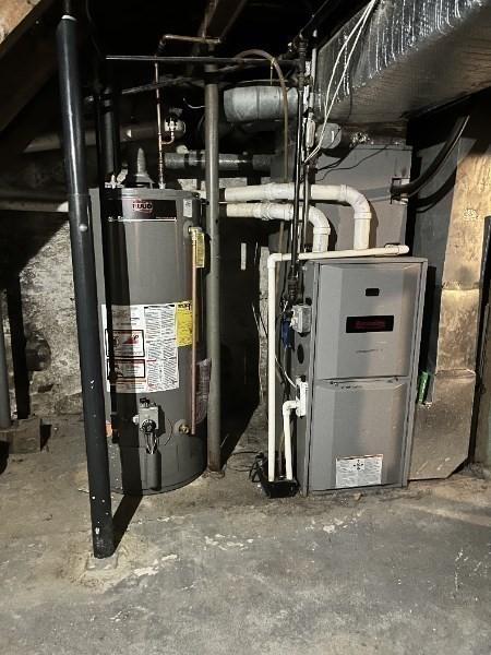 47-49 Dean St, Norton, MA 02766 - utility room with water heater