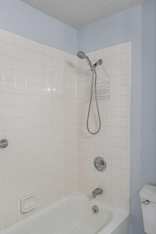 109 Bradford Commons Ln Unit 109, Braintree, MA 02184 - bathroom featuring tub / shower combination and a textured ceiling