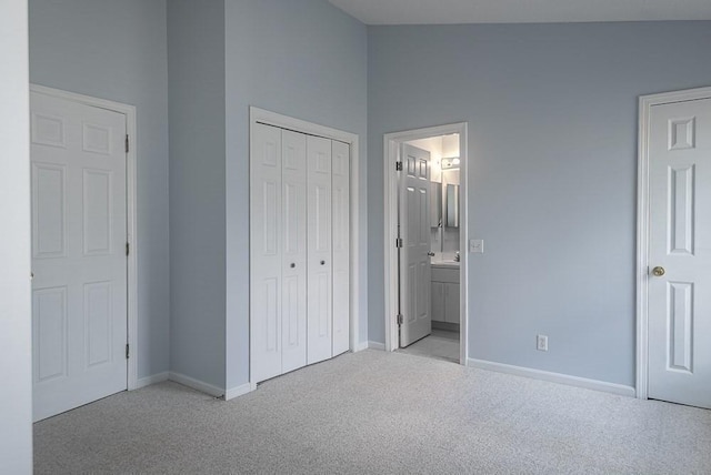 109 Bradford Commons Ln Unit 109, Braintree, MA 02184 - unfurnished bedroom with light colored carpet, a closet, and ensuite bath