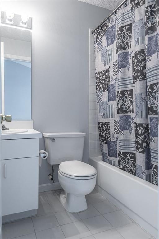 109 Bradford Commons Ln Unit 109, Braintree, MA 02184 - full bath featuring vanity, shower / tub combo with curtain, a textured ceiling, and tile patterned flooring